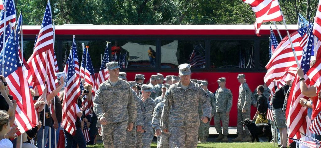 Military troops transported by Trailways charter bus rentals