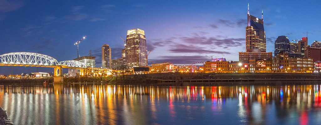Nighttime cityscape of Nashville, TN, a city served by Trailways charter bus rentals and bus service