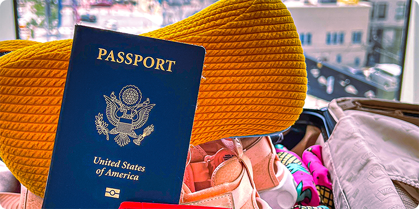 travel items with neck pillow and passport